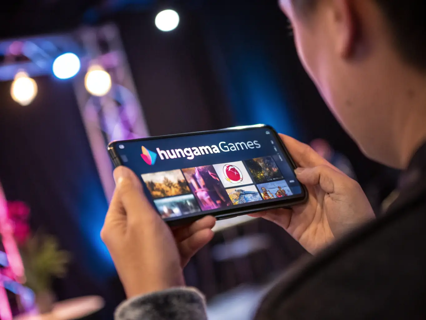 A close-up shot of a mobile device displaying the PG Entertainment City interface, showcasing a user-friendly design and easy navigation through various game options.